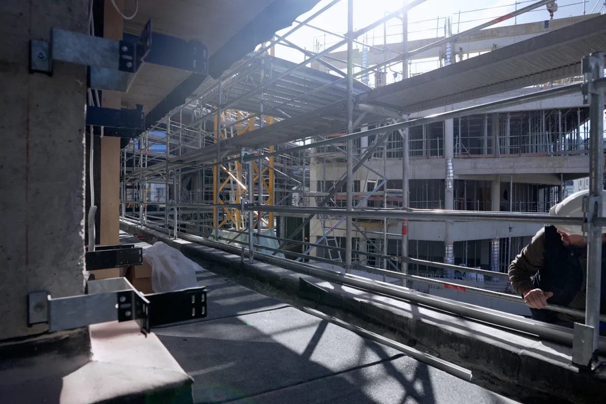 Refa construction team workin on a building - REFA Real Estate